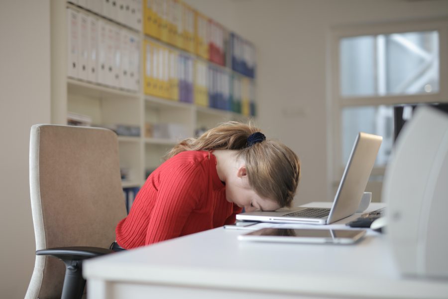 Heads down on computer